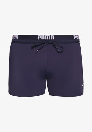 Men's swim shorts in dark navy with a PUMA logo in white. Features an elastic waistband with a drawstring and a smooth, stretchy fabric.