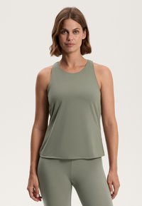 Lightweight, sleeveless athletic tank top in a muted green color. Smooth texture with a round neckline and a relaxed fit.