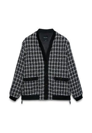 Cardigan à motifs noir et blanc avec col en V, boutons sur le devant et deux poches. Comprend des poignets et un ourlet côtelés. Confectionné en tissu texturé.