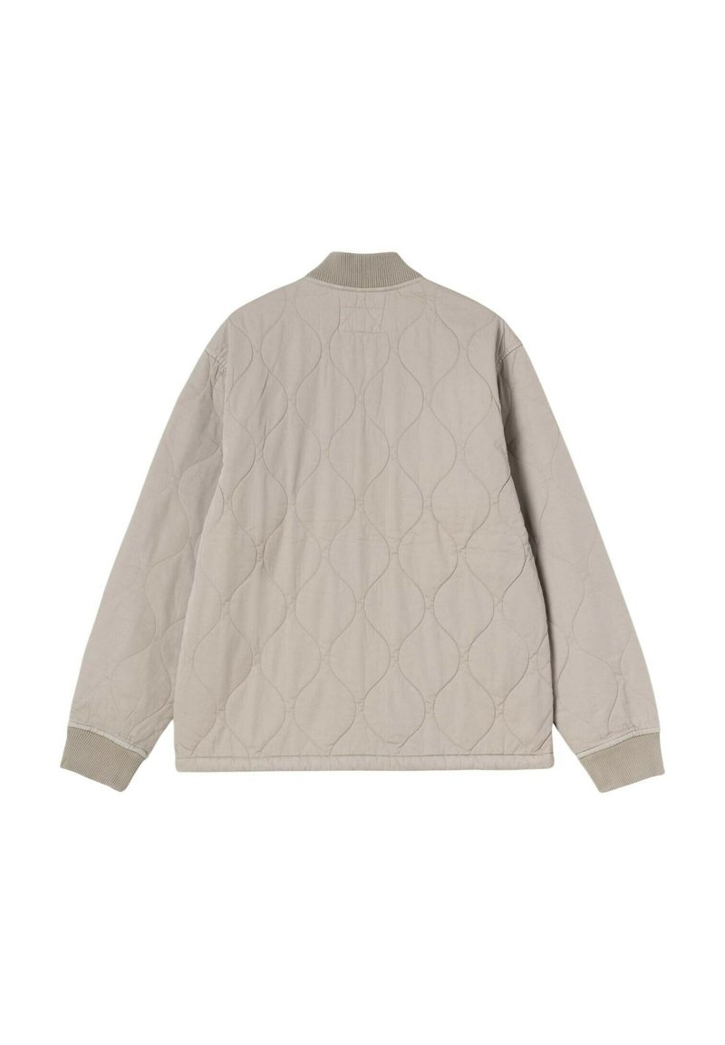 Veste matelassée beige clair à manches longues, avec poignets et col côtelés, vue de dos sur fond blanc.
