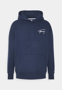 Marineblå hoodie i bomull med dragsko i huven, framficka i kängurustil och broderad logotyp på bröstet. Mjuk textur.