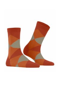 Chaussettes orange et beige avec un motif géométrique comportant des formes entrelacées. Fabriquées en matériau doux, avec un bord côtelé pour un ajustement sécurisé.