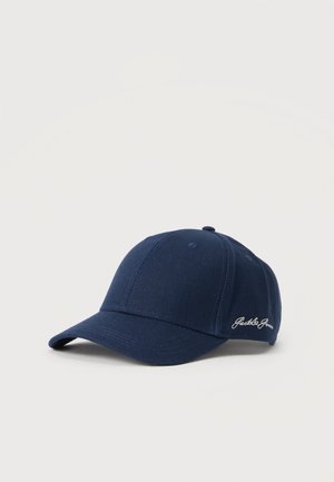 Navy blue baseball cap with curved brim and small white embroidered logo on side, displayed on plain light background.
