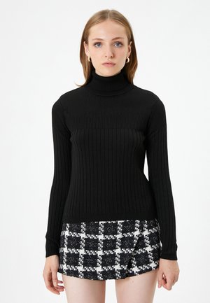 - Sweter