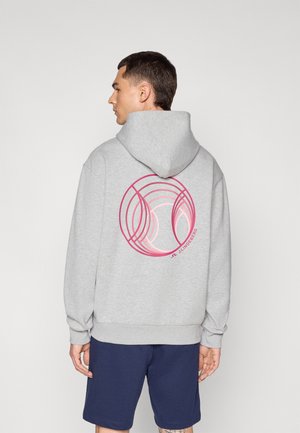 Gray hoodie with a large pink circular graphic on the back, featuring concentric circles. Kangaroo pocket and adjustable hood.