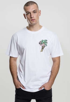 White cotton t-shirt featuring a colorful palm tree and flamingo graphic on the left chest area. Classic fit, short sleeves.