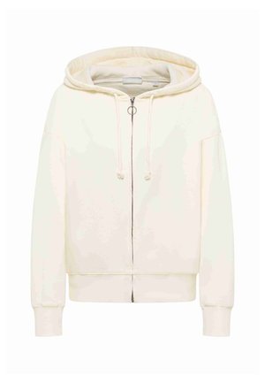 Kremfarvet hættetrøje med lynlås, snoretræk, ribben ved ærmerne og hætte, vist på en hvid baggrund.
