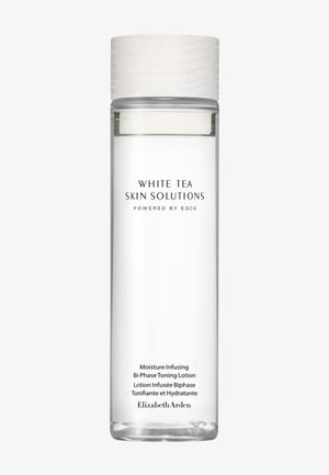 Botella cilíndrica transparente de loción tónica bifásica hidratante de Elizabeth Arden White Tea Skin Solutions con tapa blanca texturizada.