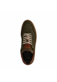 Green suede sneaker with beige laces, brown leather accents, perforated toe, and rubber sole. Features a logo tag on the tongue.