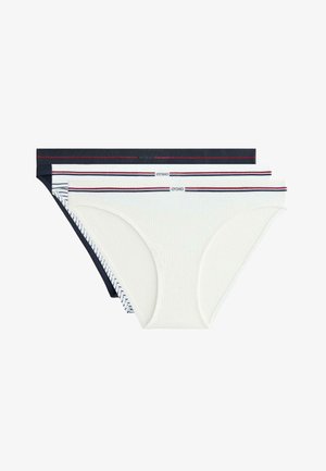 Tri páry dámskych nohavičiek: námornícka modrá, biela a pruhovaná. Mäkká bavlnená látka so žíhanou textúrou. Každý pár má logo a kontrastný pás.