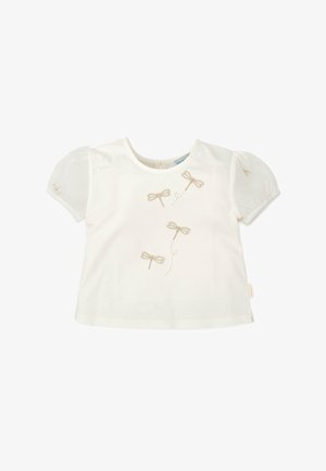 Camiseta blanca de manga corta con mangas abullonadas de organza y bordado dorado de libélula en la parte frontal. Material de algodón suave, escote redondo.