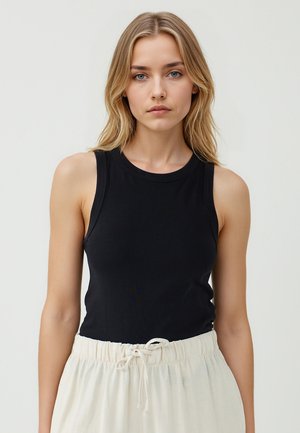 Top senza maniche nero con scollo tondo, realizzato in morbido cotone, con una vestibilità slim e una superficie liscia.
