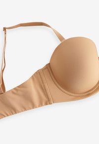 Reggiseno imbottito beige con tessuto liscio, spalline regolabili e chiusura a gancio laterale. Presenta un design senza cuciture per il massimo comfort.