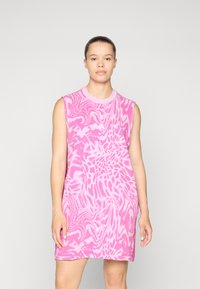 Sleeveless pink dress featuring a bold abstract pattern, a round neckline, and a relaxed fit with soft, smooth fabric texture.
