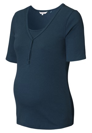 Haut de maternité bleu marine à manches courtes côtelées avec col en V et fermeture éclair discrète à l'avant, conçu pour le confort et la facilité pendant la grossesse.
