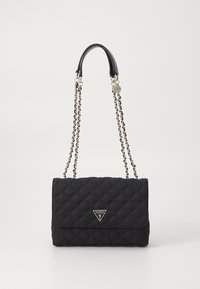 Black quilted handbag with a chain strap, featuring a triangular logo plaque at the front. Fabric has a textured finish.