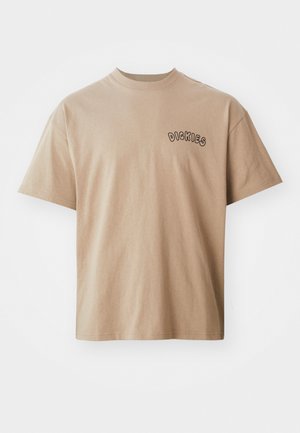Beige short-sleeve t-shirt made of cotton, featuring a crew neck and "DICKIES" logo in a rounded, black font on the left chest area.