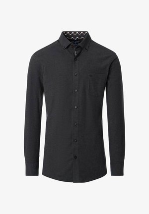 Donkergrijze lange mouwen shirt van textuurstof. Voorzien van een button-down kraag, een voorzak en een contrasterende, gemusterde binnenkraag.