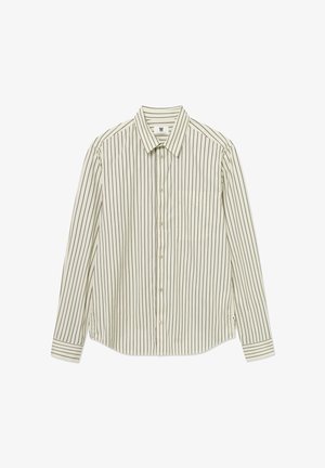 Gaiši krāsota pogām aiztaisāma krekls ar vertikālām tumšām svītrām, vienu krūšu kabatu un garām piedurknēm. Izgatavots no gludas auduma ar apkakli.