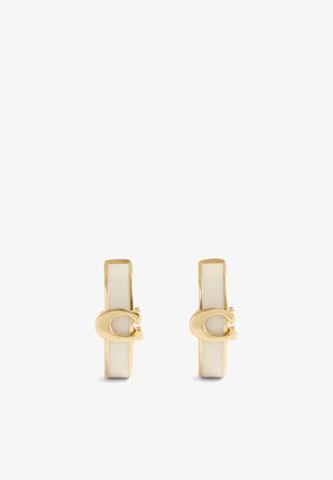 Gold-tone hoop earrings featuring a glossy white stripe and a clasp design, with smooth surface and minimalistic accents.