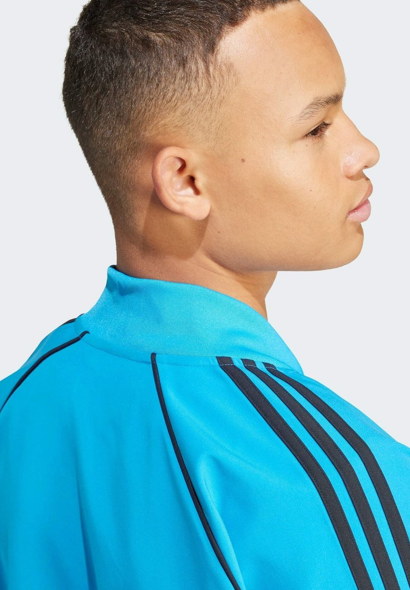 adidas Originals BONDED TRACK - Sportovní bunda - bright blue