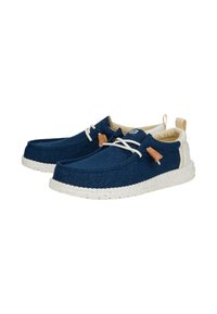 Scarpe in tessuto blu navy con finitura testurizzata, suola maculata bianca e accenti marroni a contrasto. Presentano lacci elastici per una facile vestibilità.