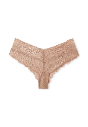 Nude kleur kant string, met bloemenpatronen, gegolfde randen en een zachte textuur. Het ontwerp is delicaat maar toch gestructureerd.