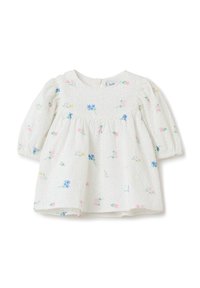 Blusa bianca per bambini con maniche a sbuffo, stampa floreale nei toni del rosa e blu, tessuto strutturato, scollatura rotonda e chiusura con zip sul retro.
