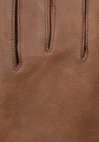 Brown leather glove featuring three finger openings, smooth texture, and fine stitching along the edges. No additional embellishments visible.