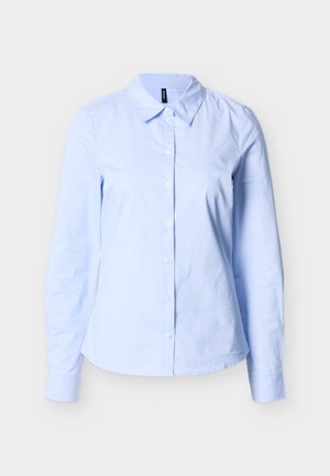 Light blue women's long-sleeve button-up shirt with subtle white vertical stripes and a pointed collar on a neutral background.