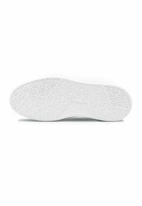 Witte sneakersole met een gestructureerd oppervlak en een geometrisch patroon, en een licht verhoogd midden voor grip.