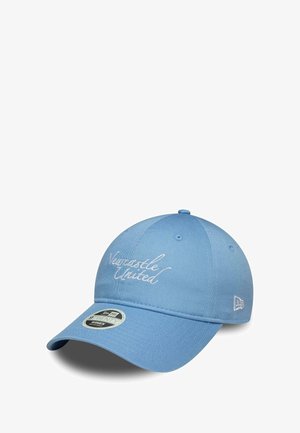 Light blue baseball cap with "Newcastle United" embroidered in white script on front and a New Era logo on the side.