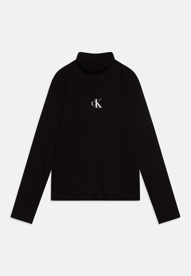 Črni rebrasti pulover s kolebnico in dolgimi rokavi. Ima bel logotip "cK" v središču prsnega dela. Gladka tekstura, oprijet kroj.