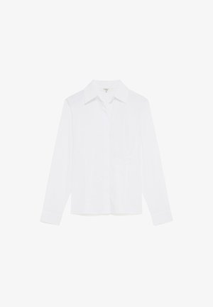 Camicia bianca a maniche lunghe con colletto, chiusura con bottoni frontale e taschino singolo sul petto; realizzata in un tessuto leggero e liscio.