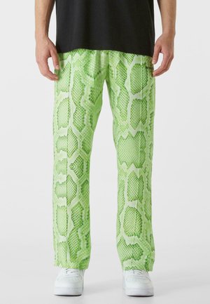 ALL OVER SNAKE - Trousers - green