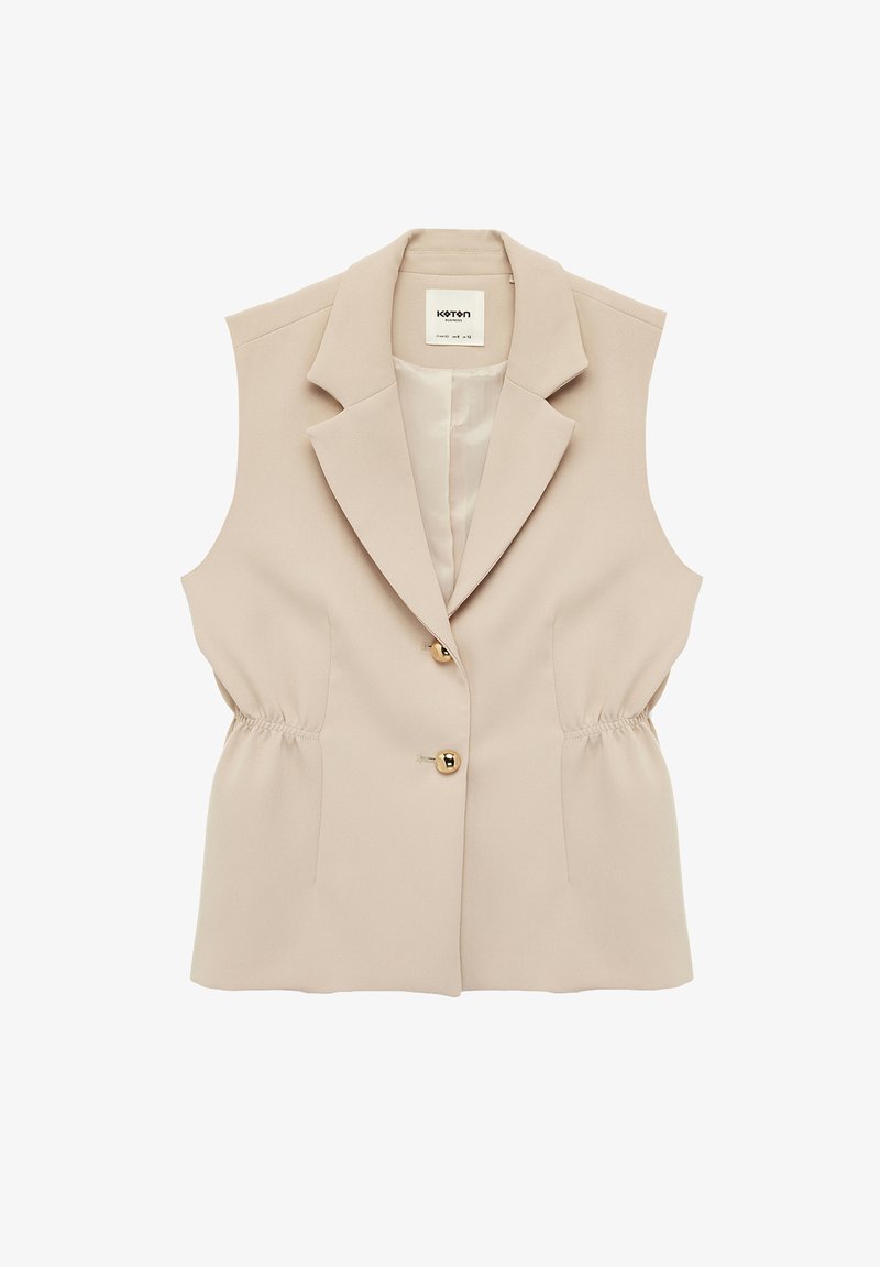 Chaleco blazer sin mangas beige con cuello de solapa, dos botones dorados y costados elásticos fruncidos sobre fondo blanco.