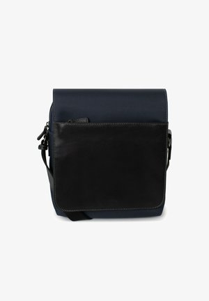 Navy blue messenger bag with a textured fabric body and a contrasting smooth black leather front pocket. Adjustable shoulder strap included.