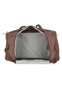 Brown fabric duffel bag with a zip closure, khaki interior, two top handles, and an adjustable shoulder strap. Spacious with no additional pockets.