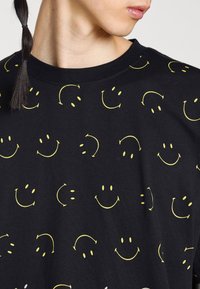 sandro T-shirt z nadrukiem