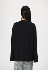 Weekday OVERSIZED LONG SLEEVE - Langærmet T-shirt - black