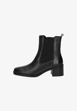 Bottes chelsea en cuir noir avec des panneaux élastiques sur les côtés, un bout rond et un talon bloc texturé. Dotées d'une languette à l'arrière.