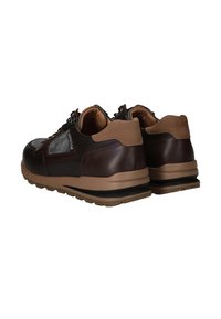 Brown leather sneakers with grey accents, padded brown collar, textured surface, and rubber outsole for grip. Features reinforced stitching.