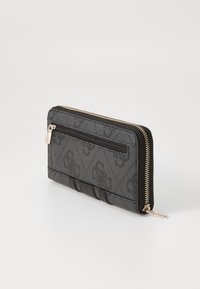 Black textured wallet with gold zipper, featuring a patterned exterior and an additional zippered pocket on the back.