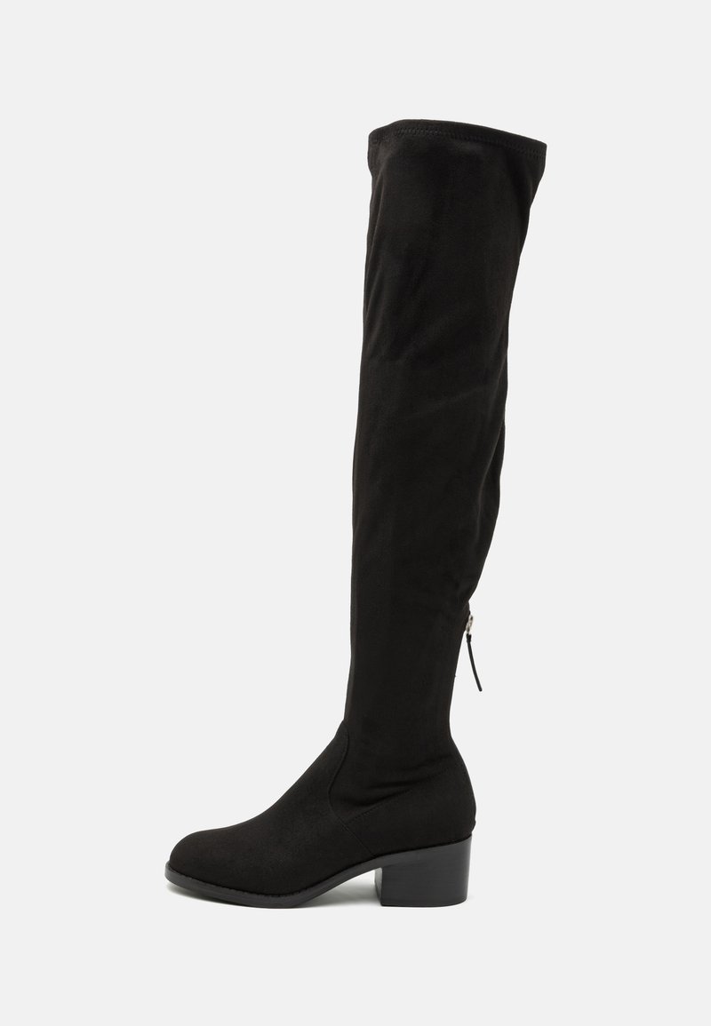 Black over-the-knee boot made of soft suede fabric, with a block heel and side zipper detail for easy wear. Smooth texture.