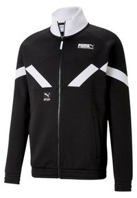 Fekete dzseki fehér átlós díszítéssel, magas gallérral, elől cipzárazva és oldalsó zsebekkel. Bal mellrészen kis logófolttal rendelkezik.