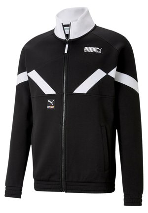 Mustatakki, jossa on valkoisia diagonaalisia yksityiskohtia, korkea kaulus, etuvetoketju ja sivutaskut. Vasemmassa rinnassa on pieni logo-patch.