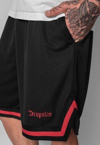 Dropsize LOGO - Tracksuit bottoms - black