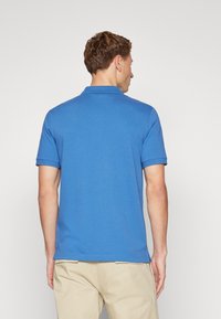 Calvin Klein BUTTON - Poloskjorter - delta blue