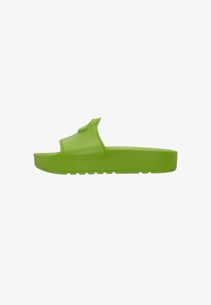 Green slide sandal made of smooth rubber, featuring a contoured strap and a flat sole with a textured bottom for grip.