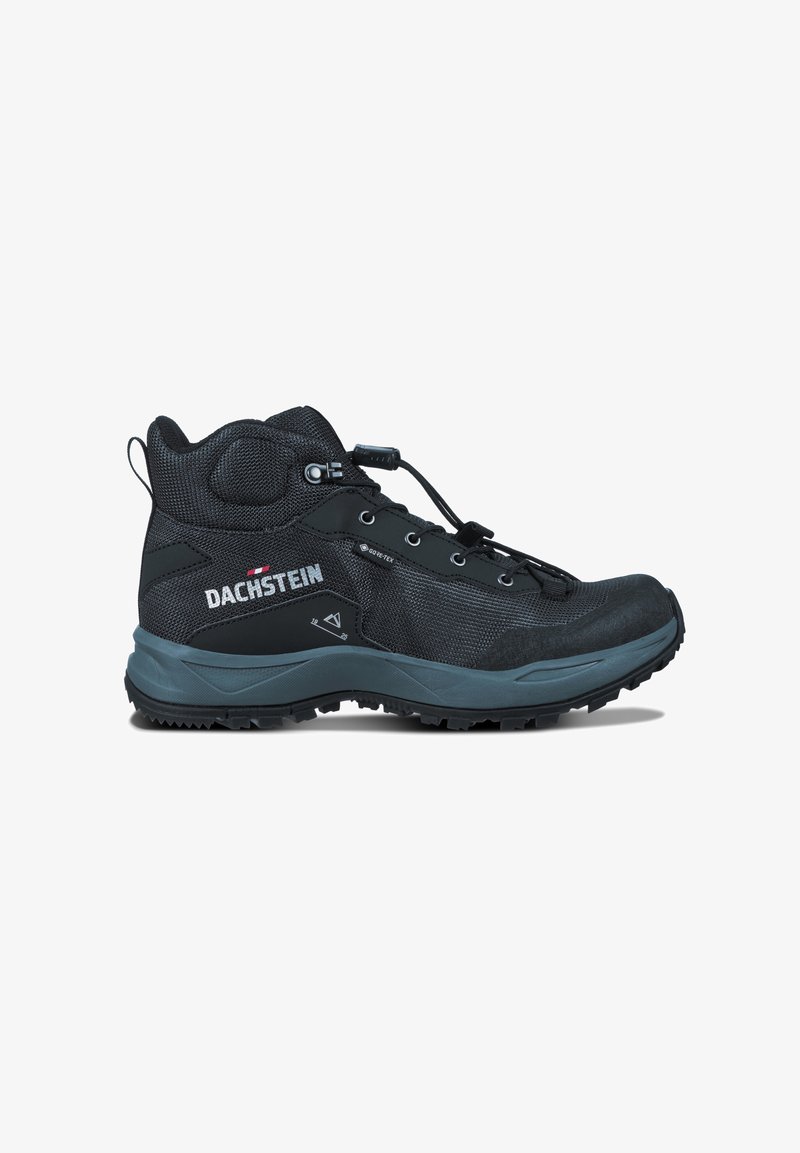 Botte de randonnée noire mi-hauteur avec Gore-Tex, système de laçage rapide et semelle texturée bleu-gris, marque Dachstein sur le panneau latéral.